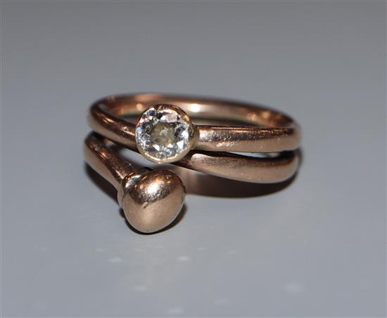 An early 20th century old mine cut diamond set twin open shank dress ring, size O.